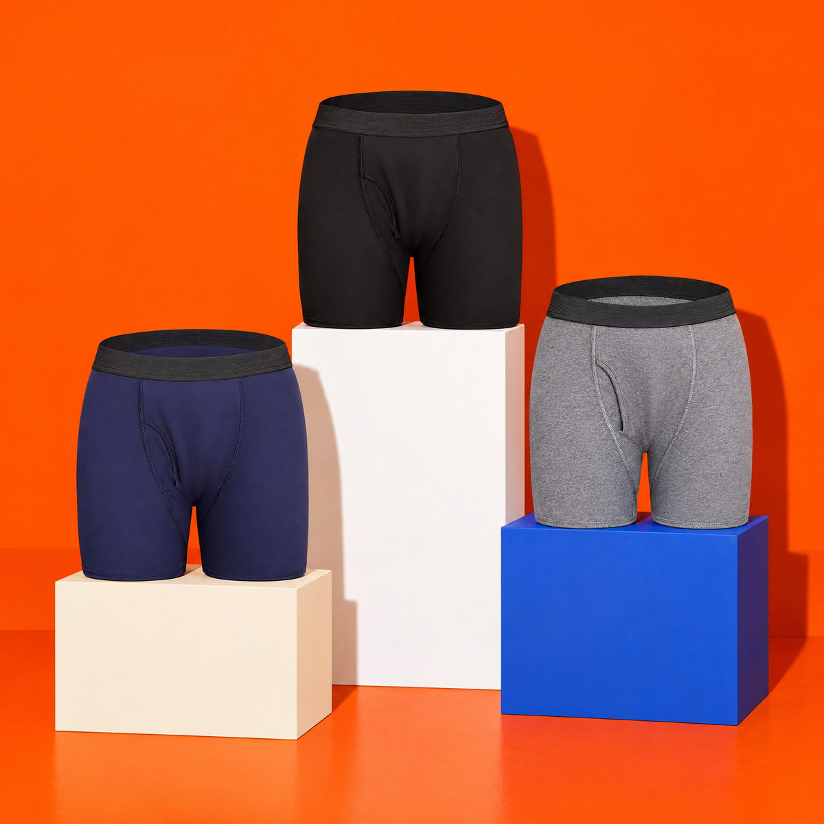 Dryden boxer briefs in navy, black and grey on plinths